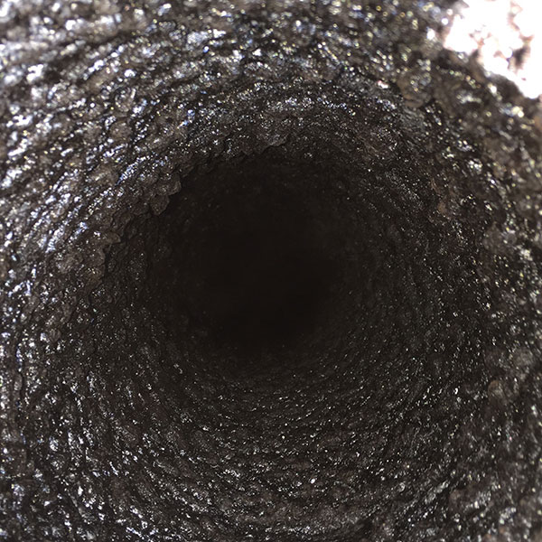 creosote buildup in chimney flue, hanover ma